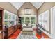 Bright and airy living room features hardwood floors, modern furniture, and ample natural light at 2012 Arbor Springs Way, Buford, GA 30519