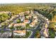 Aerial view of a neighborhood, showcasing the community layout and surrounding green spaces at 303 Fox Overlook, Woodstock, GA 30188
