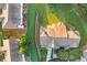 Aerial view of the home with well-manicured landscaping and driveway at 303 Fox Overlook, Woodstock, GA 30188