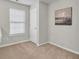 Bright room with carpet, window and neutral paint at 303 Fox Overlook, Woodstock, GA 30188
