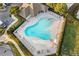 A scenic overhead shot of the community pool, surrounded by ample seating and lush landscaping at 303 Fox Overlook, Woodstock, GA 30188