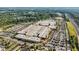 Extensive aerial view of a shopping center featuring diverse retail options, wide parking and highway access at 303 Fox Overlook, Woodstock, GA 30188
