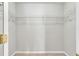 Walk-in closet with wire shelving and carpet flooring at 303 Fox Overlook, Woodstock, GA 30188