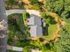 Aerial view showcases landscaped yard, patio and driveway at 278 Shire Way, Lawrenceville, GA 30044