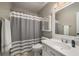 Bathroom with a combination shower and tub at 278 Shire Way, Lawrenceville, GA 30044