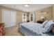 Cozy bedroom featuring a double closet and natural lighting at 278 Shire Way, Lawrenceville, GA 30044