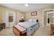 Bedroom with neutral walls, natural light, and closet at 278 Shire Way, Lawrenceville, GA 30044