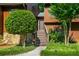 Charming entrance with stone accents and lush landscaping at 278 Shire Way, Lawrenceville, GA 30044