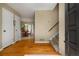 Inviting foyer with hardwood floors and staircase at 278 Shire Way, Lawrenceville, GA 30044