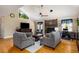Spacious living room boasts vaulted ceilings, stone fireplace, and hardwood floors at 278 Shire Way, Lawrenceville, GA 30044