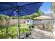 Brick patio with outdoor seating and grilling area in a private backyard at 3198 Liberty Commons Dr, Kennesaw, GA 30144