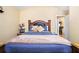 Comfortable bedroom features a king bed, soft lighting, and neutral tones, offering a relaxing and inviting space at 3198 Liberty Commons Dr, Kennesaw, GA 30144