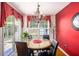 Bright dining room with chandelier and sliding glass doors leading to a patio at 3198 Liberty Commons Dr, Kennesaw, GA 30144