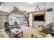 Spacious and carpeted garage with sofa, recliners, and storage cabinets at 3198 Liberty Commons Dr, Kennesaw, GA 30144