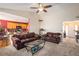 Comfortable living room with high ceilings featuring an open floor plan and plush leather sofas at 3198 Liberty Commons Dr, Kennesaw, GA 30144