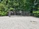 Fenced basketball court with multiple hoops provides a great recreational amenity within the community at 750 Whitehall Way, Roswell, GA 30076