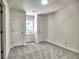 Spacious bedroom with neutral carpet and two door for convenience at 750 Whitehall Way, Roswell, GA 30076