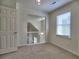 Bright bedroom with a large window providing natural light and a neutral color palette at 750 Whitehall Way, Roswell, GA 30076