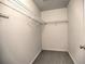 A simple walk-in closet for maximizing storage with basic wire shelving at 750 Whitehall Way, Roswell, GA 30076