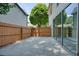 Backyard concrete patio with fenced perimeter at 1971 Wellesley Trce, Dunwoody, GA 30338