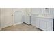 Bathroom featuring tile floors, double sink vanity, and crisp design at 1971 Wellesley Trce, Dunwoody, GA 30338