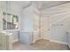 Bathroom featuring a glass shower, window, and vanity at 1971 Wellesley Trce, Dunwoody, GA 30338