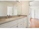 Bathroom featuring double vanity and access to the bedroom at 1971 Wellesley Trce, Dunwoody, GA 30338