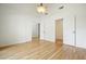 Empty bedroom with vaulted ceiling and wood floors at 1971 Wellesley Trce, Dunwoody, GA 30338