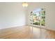 Empty bedroom with a large window at 1971 Wellesley Trce, Dunwoody, GA 30338