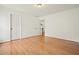 A simple bedroom with hardwood floors and plenty of space at 1971 Wellesley Trce, Dunwoody, GA 30338
