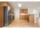 Spacious kitchen with stainless steel appliances and hardwood floors at 1971 Wellesley Trce, Dunwoody, GA 30338