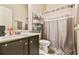 Bathroom featuring tile floors, a shower with curtain, and vanity at 2102 Black Pebble Cir, Buford, GA 30519