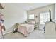 Comfortable bedroom with a window that brings in natural light at 2102 Black Pebble Cir, Buford, GA 30519
