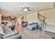 Open concept living room seamlessly flowing into the kitchen, perfect for entertaining and Gathering gatherings at 2102 Black Pebble Cir, Buford, GA 30519
