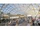 Airport view with a modern steel structure over a busy terminal and roadway at 5453 Baybrook Cir, South Fulton, GA 30349