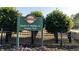 A park sign amid green shrubs and trees, welcoming visitors to the natural space at 5453 Baybrook Cir, South Fulton, GA 30349