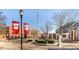 A beautifully landscaped school with manicured lawns and a charming brick building at 5453 Baybrook Cir, South Fulton, GA 30349