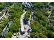 Aerial view showcases the property's lush surroundings, manicured grounds and the community's layout at 1445 Monroe Ne Dr # F12, Atlanta, GA 30324