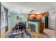 Charming dining room featuring a modern light fixture and bar-top kitchen access at 1445 Monroe Ne Dr # F12, Atlanta, GA 30324