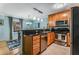 Well-appointed kitchen featuring granite countertops, stainless steel appliances, and tile flooring at 1445 Monroe Ne Dr # F12, Atlanta, GA 30324