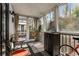 Sunroom with lots of natural light, a tile floor, and views of the surrounding landscape at 1445 Monroe Ne Dr # F12, Atlanta, GA 30324
