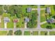 Aerial view showcasing the property's location within a neighborhood with mature trees at 254 Wood Duck Dr, Jonesboro, GA 30238