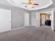 Spacious bedroom with ceiling fan and adjoining sitting area, offering versatile space at 254 Wood Duck Dr, Jonesboro, GA 30238