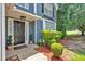 Inviting front door entrance with meticulously maintained landscaping and elegant details creating a welcoming curb appeal at 254 Wood Duck Dr, Jonesboro, GA 30238