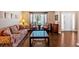 Formal living room with large window, hardwood floors, and plenty of natural light, ideal for gatherings at 254 Wood Duck Dr, Jonesboro, GA 30238
