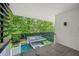 View from the balcony overlooking the pool, cabana and greenery providing an outdoor oasis at 3891 Wieuca Rd, Atlanta, GA 30342