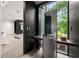 Contemporary bathroom featuring a floating vanity, unique sink, and modern fixtures at 3891 Wieuca Rd, Atlanta, GA 30342