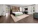 This elegant bedroom features hardwood floors, an area rug, and modern decor at 3891 Wieuca Rd, Atlanta, GA 30342
