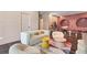 Playroom with modern furniture and unique pink storage nooks with hardwood flooring at 3891 Wieuca Rd, Atlanta, GA 30342