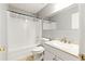 Bathroom featuring tub and shower with translucent enclosure and large mirror at 5745 Crystal Springs Way, Powder Springs, GA 30127